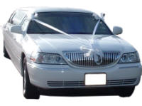 Cars for Stars (Luton) - Wedding Limo. White Lincoln stretched wedding limousine with white ribbons